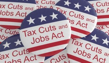 USA Politics News Badges: Pile of Tax Cuts And Jobs Act Buttons With US Flag, 3d illustration