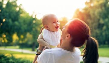 mother with infant outside